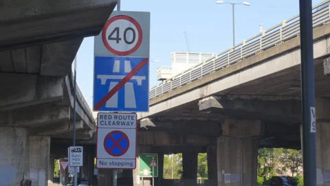 Speed limit red route not stopping road sign Stock-Footage 157163299