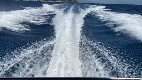 Speed motorboat contaminating water while sailing, toxic gas emission 動画素材 345478586