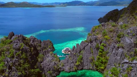 Speed ramp Coron Twin Lagoon showing island landscape. Nice aerial view drone Stock Footage 344599452
