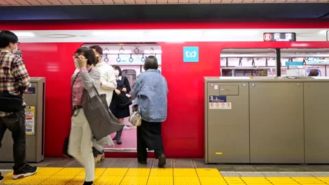 Speed Ramp of Passenger waiting on platform of Tokyo Metro Marunouchi Line Stock-Footage 189498724