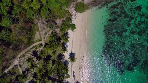 Speed ramp Tropical beach with clear water and boat. Nice aerial view drone Stock Footage 344682671