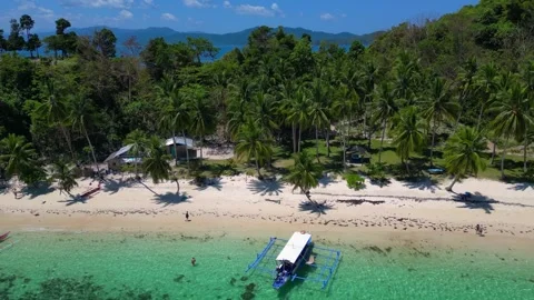 Speed ramp Tropical beach with clear water and boat. Magic aerial view drone Stock Footage 344682732