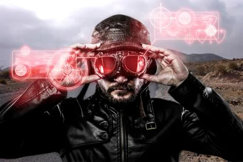 Speed red  light effects in googles biker with black leather jacket and old g 库存插图