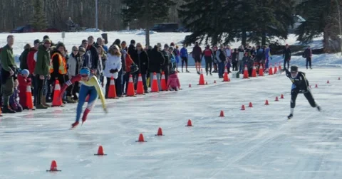 Speed Skaters race down the track at Hawrelak Park in Edmonton, Canada. Stock Footage 60804671