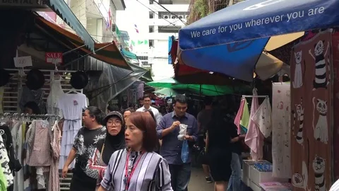 Speed timelapse of camera moving through people crowd in Thailand city urban Stock Footage 84937530