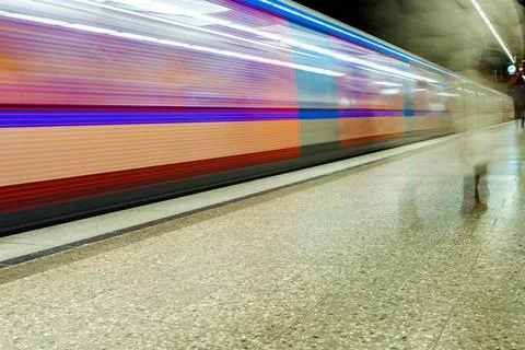Speed Train moving down the tracks Stock Photos