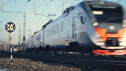 Speed train passes by signpost Stock Footage 125136299
