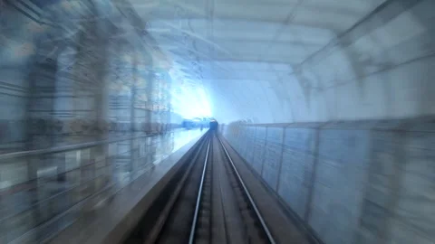 Speed underground train riding in tunnel. Subway train move fast at dark tunnel Stock Footage 302888393