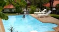 Speed up Video of Man Cleaning Swimming Pool. HD Footage