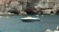 Speedboat and water sports in fisherman village Puerto de Mogan HD Footage