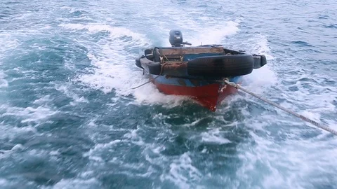 Speedboat being pulled by rope in sea Stock Footage 88889933