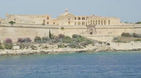 Speedboat going past old building. Stock Footage 66259904