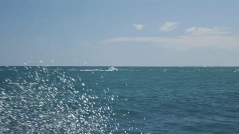 Speedboat on the Ocean Rocks Waves Stock Footage 169068124