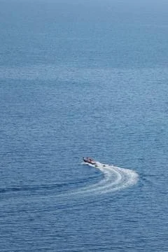 Speedboat pulling inflatable donuts boats Stock Photos