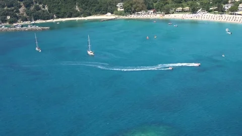 Speedboat pulls at high speed an inflatable surface Video stock 141779911