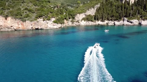 Speedboat Racing Through Crystal Clear Liapades Bay, Corfu Stock Footage 337732240