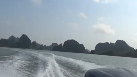 A speedboat running on the sea creates waves at its stern Video stock 332289430