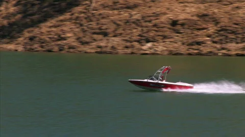 Speedboat sailing in a lake Stock Footage 876080