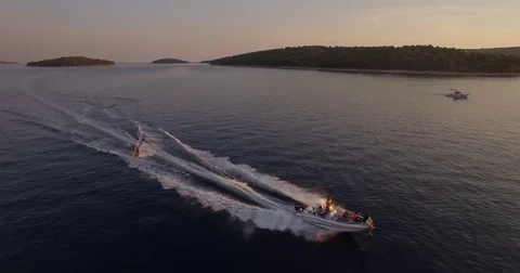 Speedboat with wakeboarder Stockbeeldmateriaal 73222780