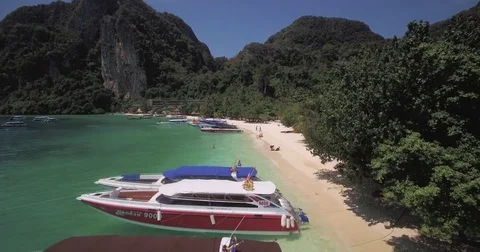 Speedboats Near The Beach On Phi Phi Don, Thailand, Aerial Flyover Stock Footage 73824568