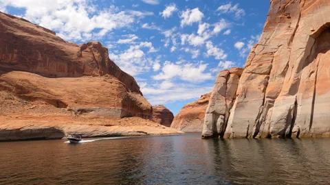 Speeding boat deep canyon cliff Lake Powell Utah POV 4K Stock Footage 136344936