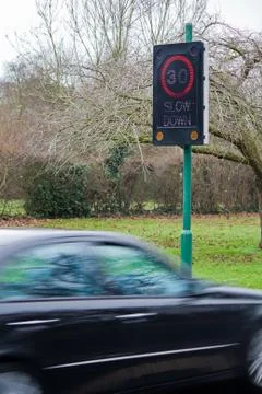 Speeding car and speed camera Stock Photos