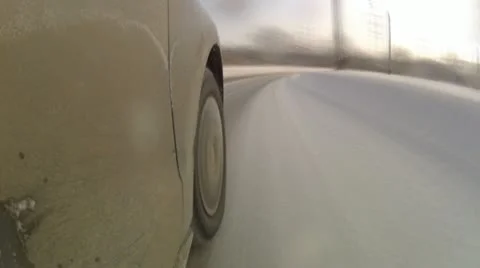 Speeding car on snowy roads Stock Footage 19024741