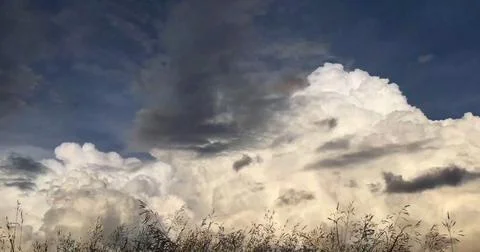 Speeding Clouds Overhead in a Dramatic Sky Photos