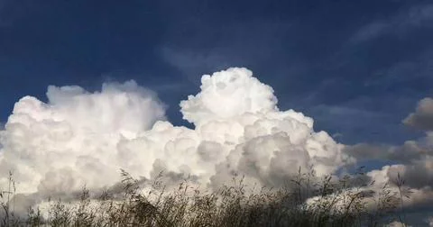 Speeding Clouds Overhead in a Dramatic Sky Stock Photos