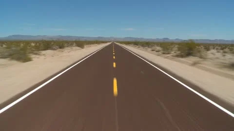 Speeding Down Abandon Mojave Desert Road Stock Footage 10912535