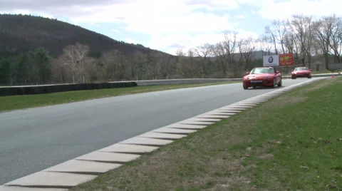 Speeding down a raceway (7 of 8) Stock Footage 32037997