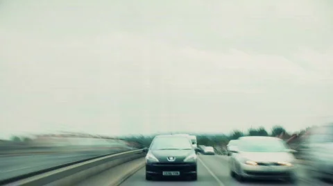 Speeding down road Stock Footage 605829