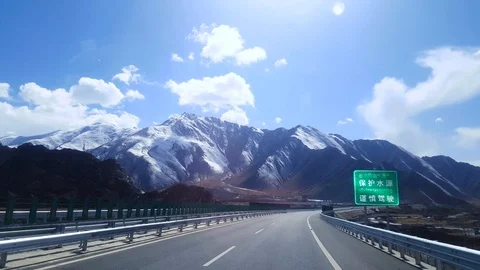Speeding on the motorway in Tibet Stock Footage 94976793