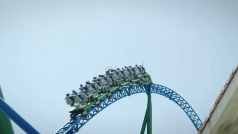 Speeding roller coaster ride. Excitement rollercoaster. Having fun in theme park Stock Footage 196149972