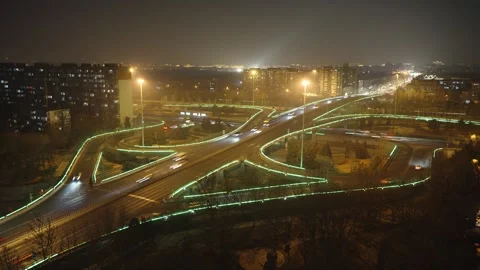 Speeding up traffic road at overpass intersection at night Stock Footage 271452799