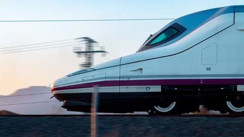 Speeding Train at Dusk Stock Photos
