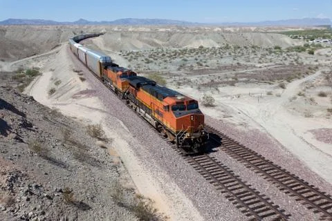 A speeding train on a railroad track Stock Photos
