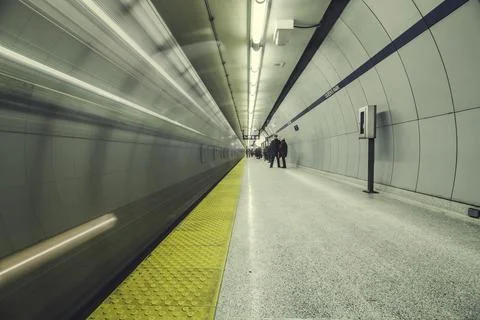 Speeding train through subway Stock Photos