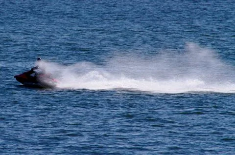Speeding on the water. Stock Photos