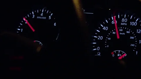 Speedometer inside a car at night Vidéo 77810169