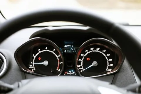 Speedometer, tachometer and fuel level in car Stock Photos