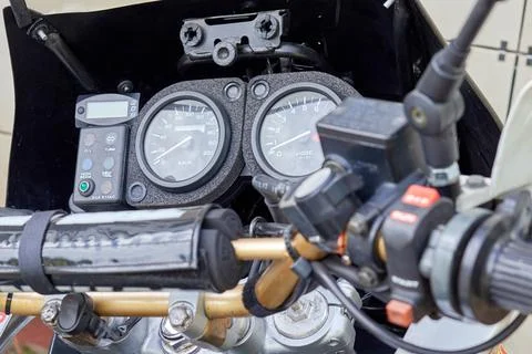 Speedometer, tachometer and handle bar of motorcycle Stock Photos