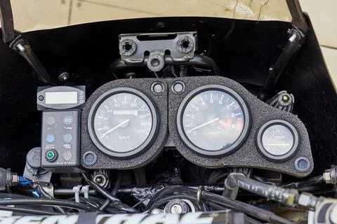 Speedometer, tachometer and handle bar of motorcycle Stock Photos