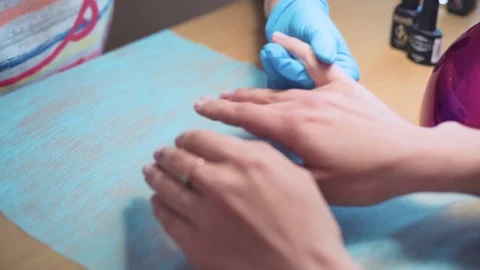 Speedpaint of making cute seals nail design in beauty salon Stock Footage 107318610