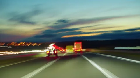 Speedy car driving the highway with a lot of lights and traffic, overtaking Stock Footage 265270853