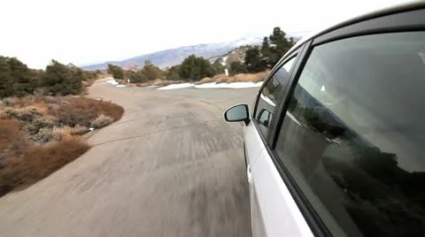 SPEEDY DRIVE DOWN A MOUNTAIN ROAD Stock Footage 10789793