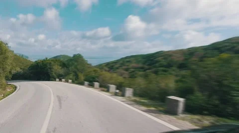 Speedy Driving on a Narrow Road in Mountains Stock Footage 59764068