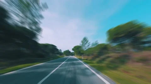 Speedy Driving on a Road in Forest Stock Footage 59705656