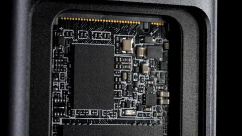 Speedy SSD Installation in Open Case with M.2 Connector on Black Background Stock Footage 270469053