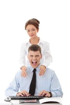 Speek up Young businessman shouting, while businesswoman stending behind h... Stock Photos
